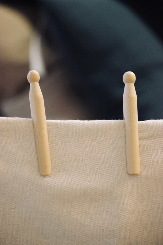 Traditional style wooden pegs. Available as a set of 25 in a cloth drawer-string bag, or singularly