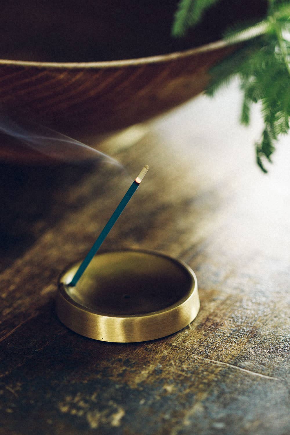 This brass incense stand is suitable for both cone-shaped incense and stick incense, including solid incense sticks. Sit back, relax, and enjoy the fragrance of your burning incense. Made by Fog Linen Work, brought to you by The Country Crib