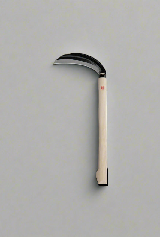 The single bevelled, Yasugi White Paper steel blade from Niwaki is light and precise enough for some serious grass scything, but robust enough for a bit of you-know-what with the tougher stuff, brambles etc. Nothing woody though.
Reassuring heeled handle in poplar wood.